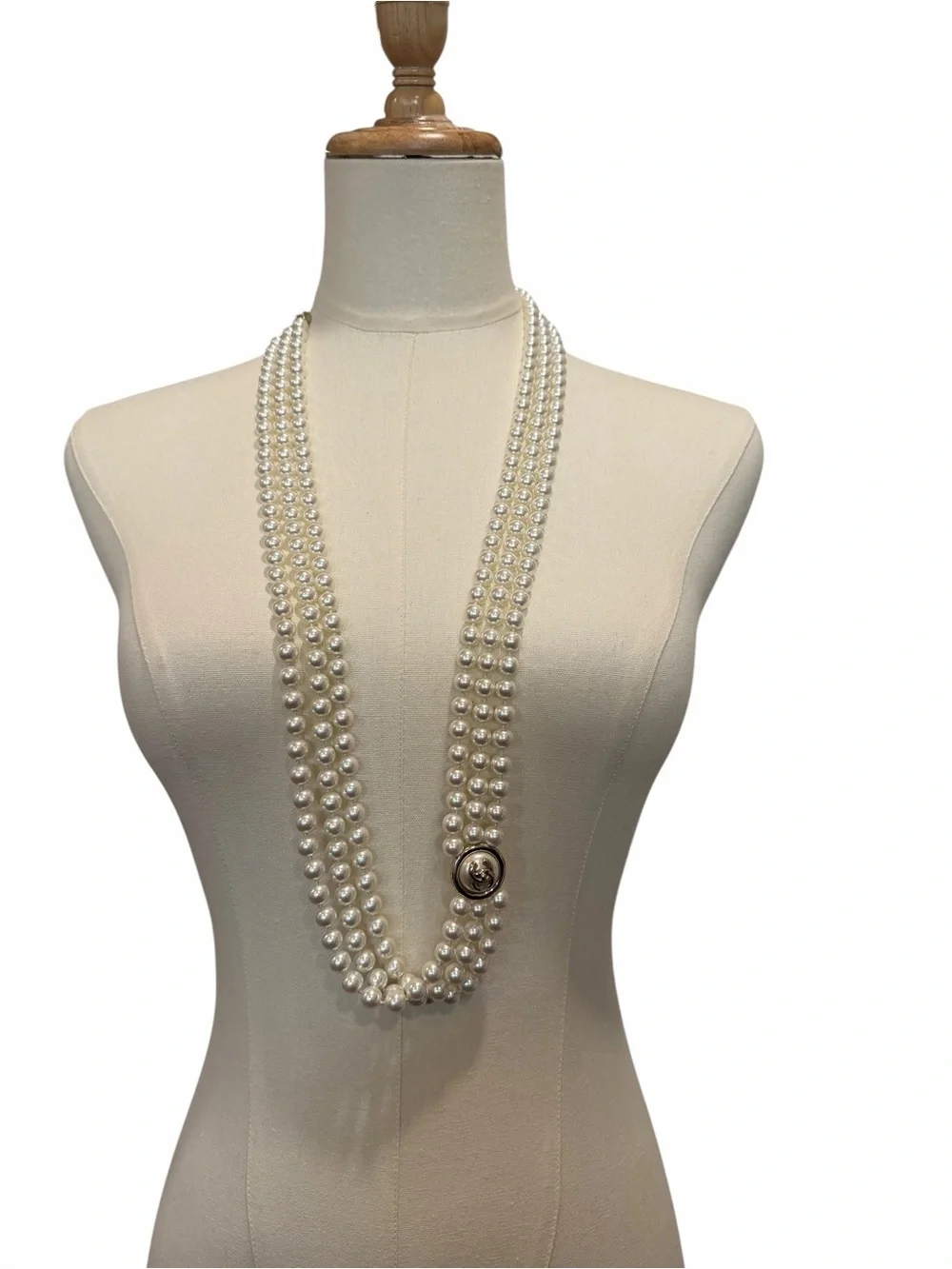 CHANEL Ivory Triple-Strand Faux Pearl Necklace with Signature Medallion